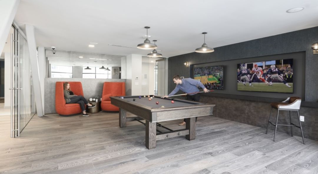 large game room with pool table at 200 Presidential Way