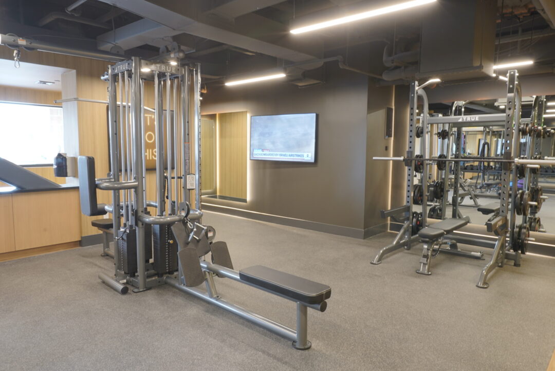 fitness center with an array of workout equipment.