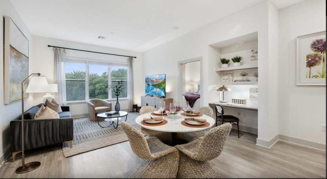 open concept living area and dinging area with hardwood floors and natural light
