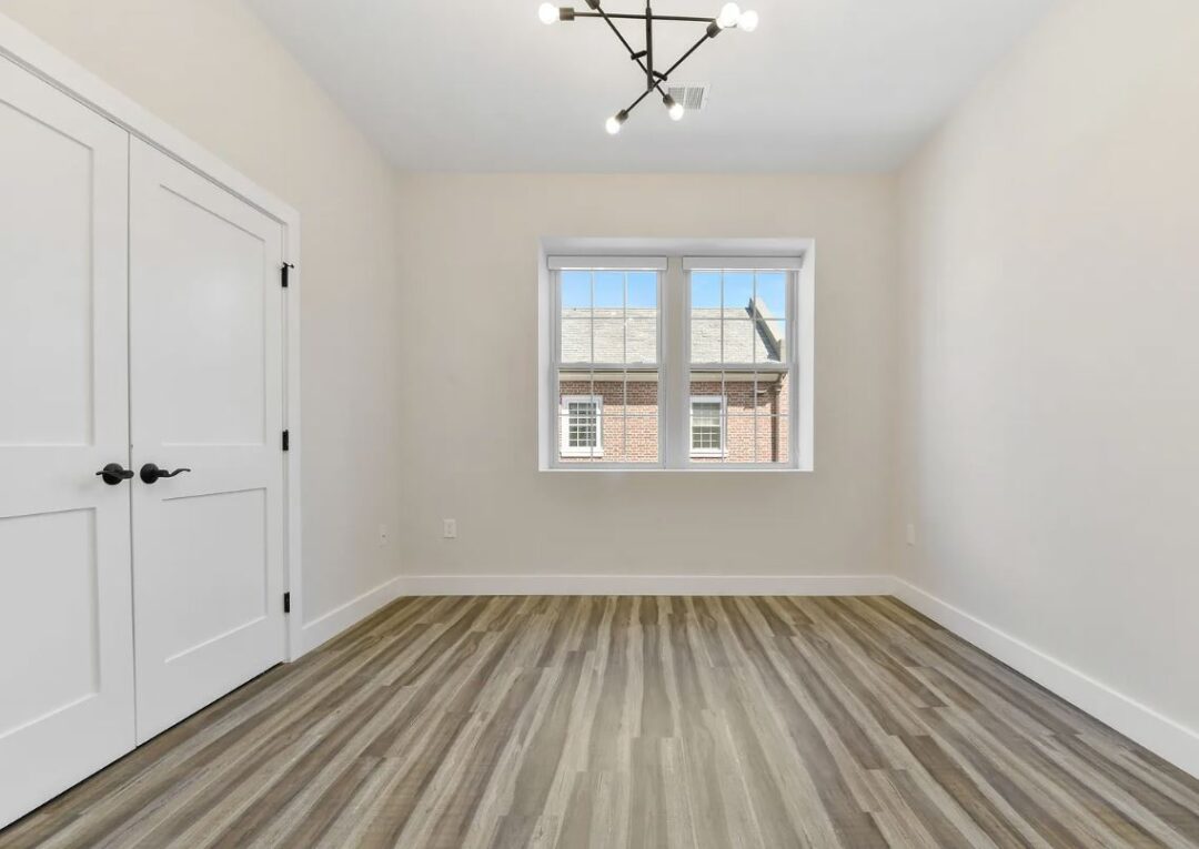402 - 410 washington st modern bedroom with natural light and wood floors