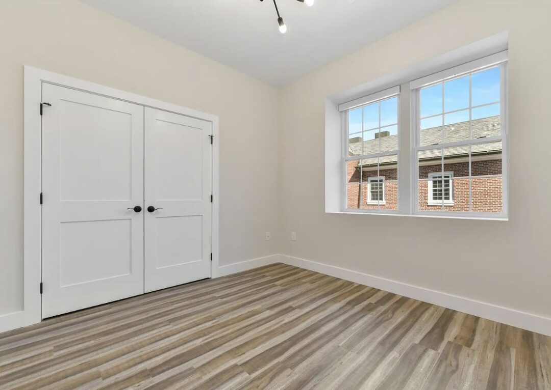402 - 410 washington st modern bedroom with natural light and wood floors
