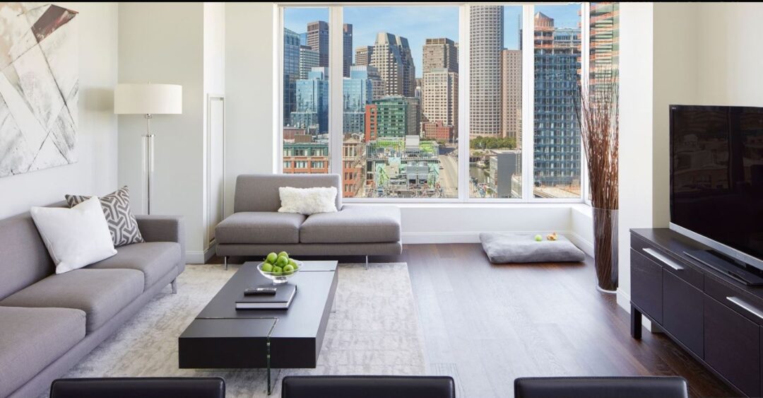 modern living room with wood floors and picture window